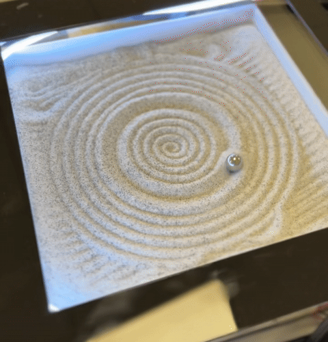 The sand board drawing a spiral